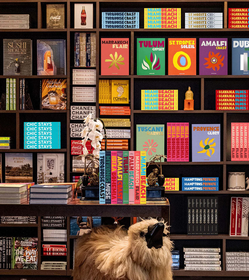Assouline store with walls & tables of books