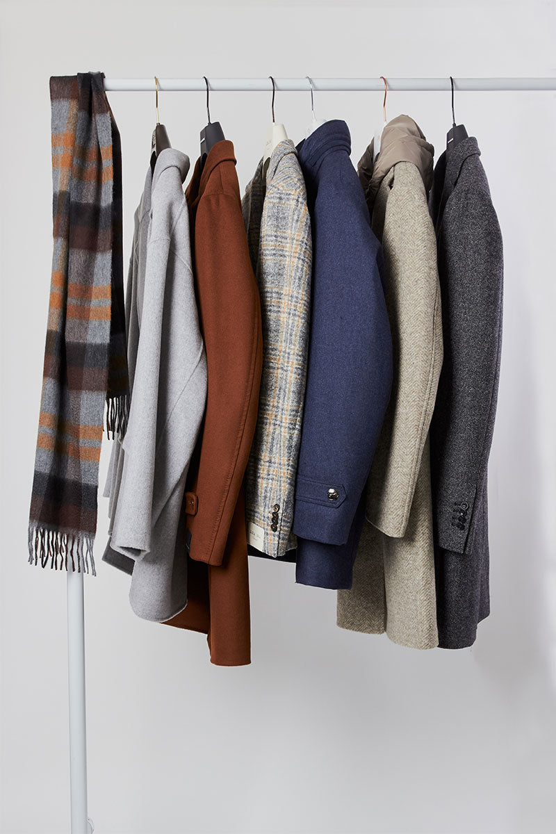 Rolling rack of men's coats