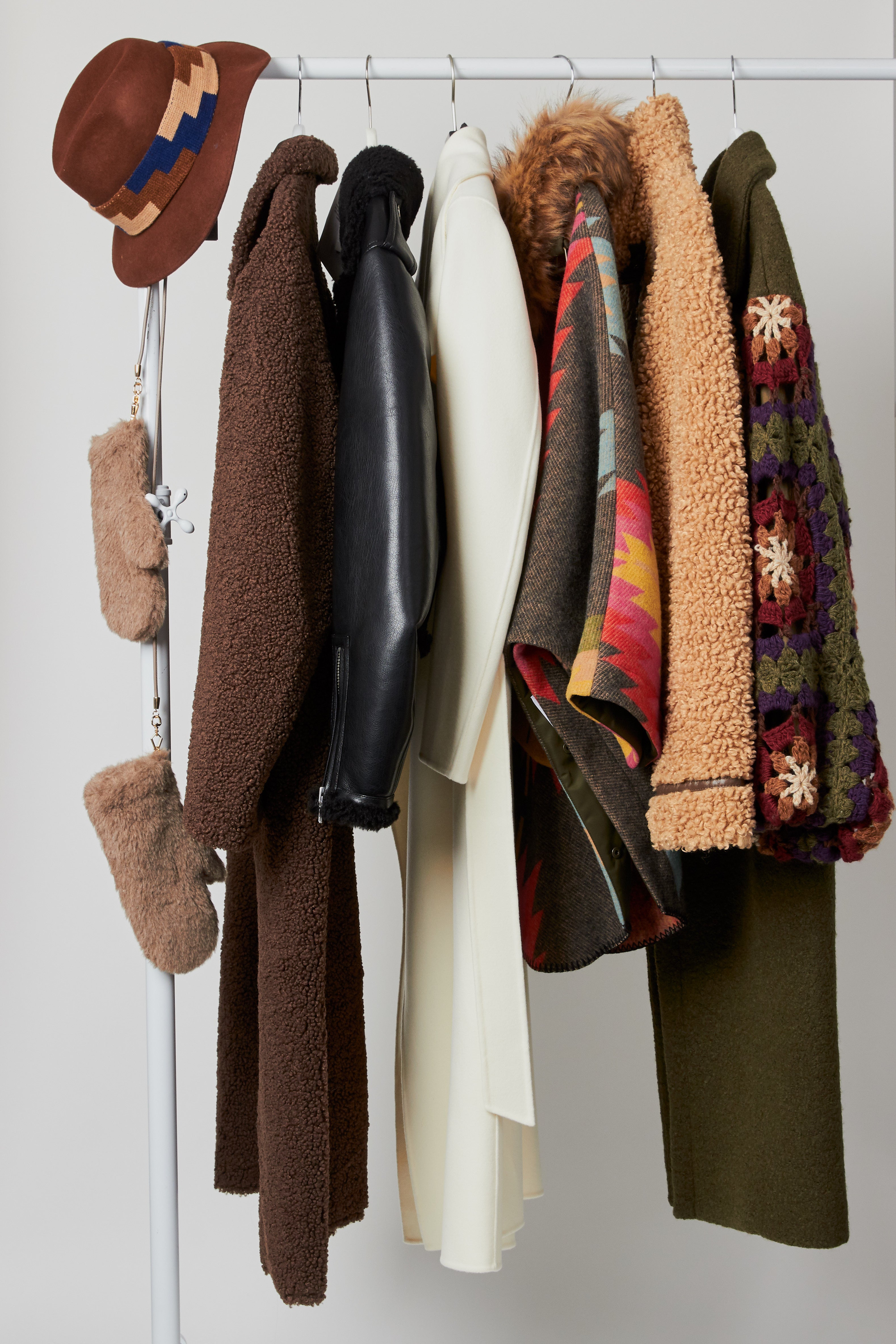 Rolling rack of coats & accessories