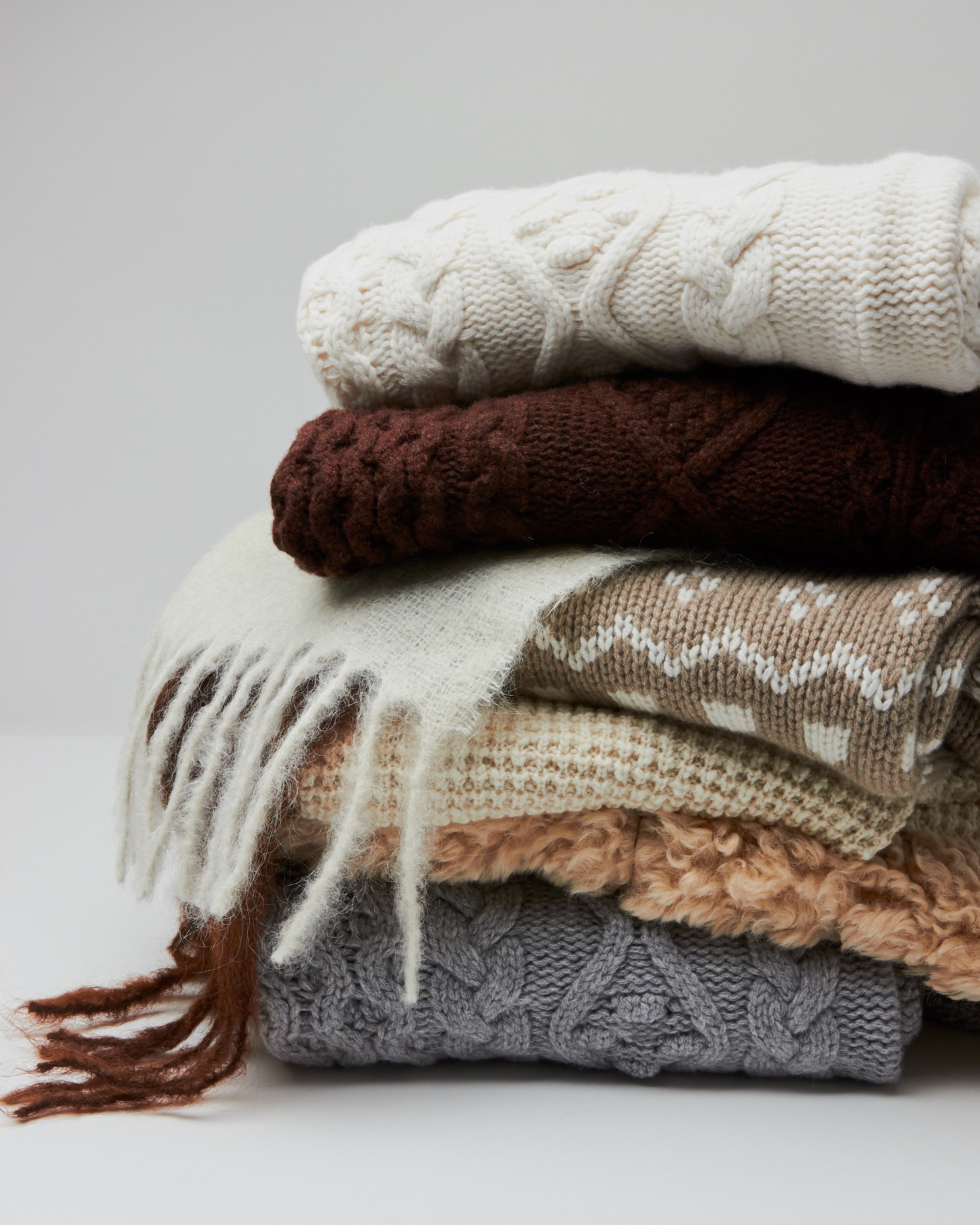 Pile of sweaters