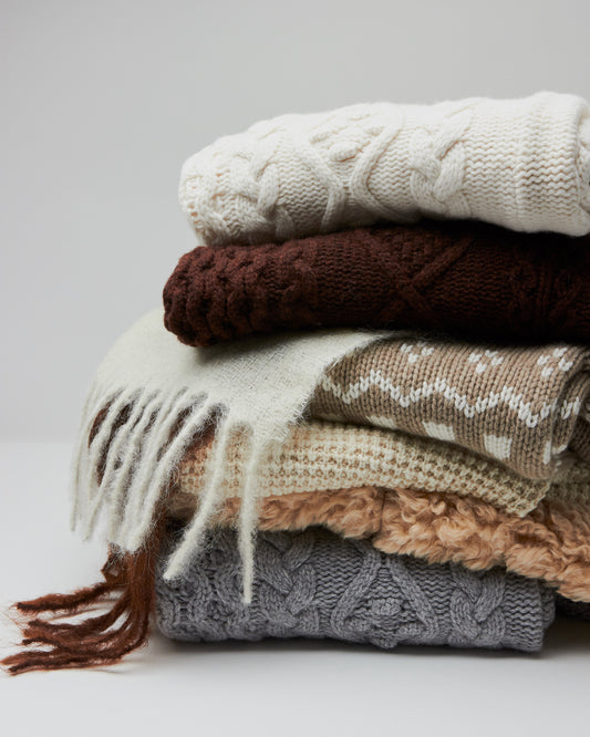 Pile of sweaters